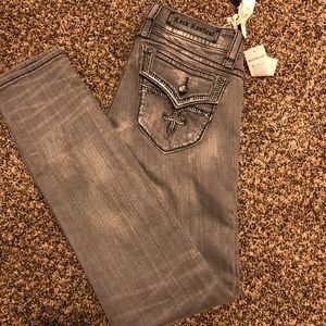 Rock revival, grey denim with bling pockets.